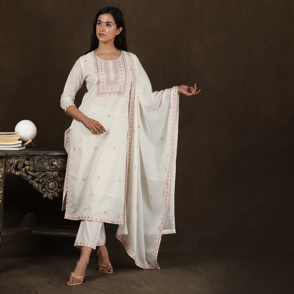 Off-White Cotton Suit Set with All Over Embroidery and Heavy Neckline– 3pc - Aavarana by Karnika