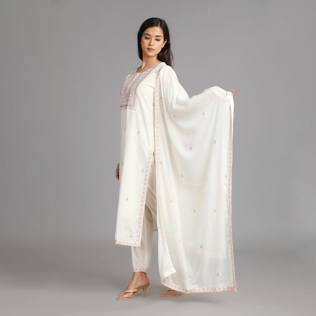 Off-White Cotton Suit Set with All Over Embroidery and Heavy Neckline– 3pc - Aavarana by Karnika