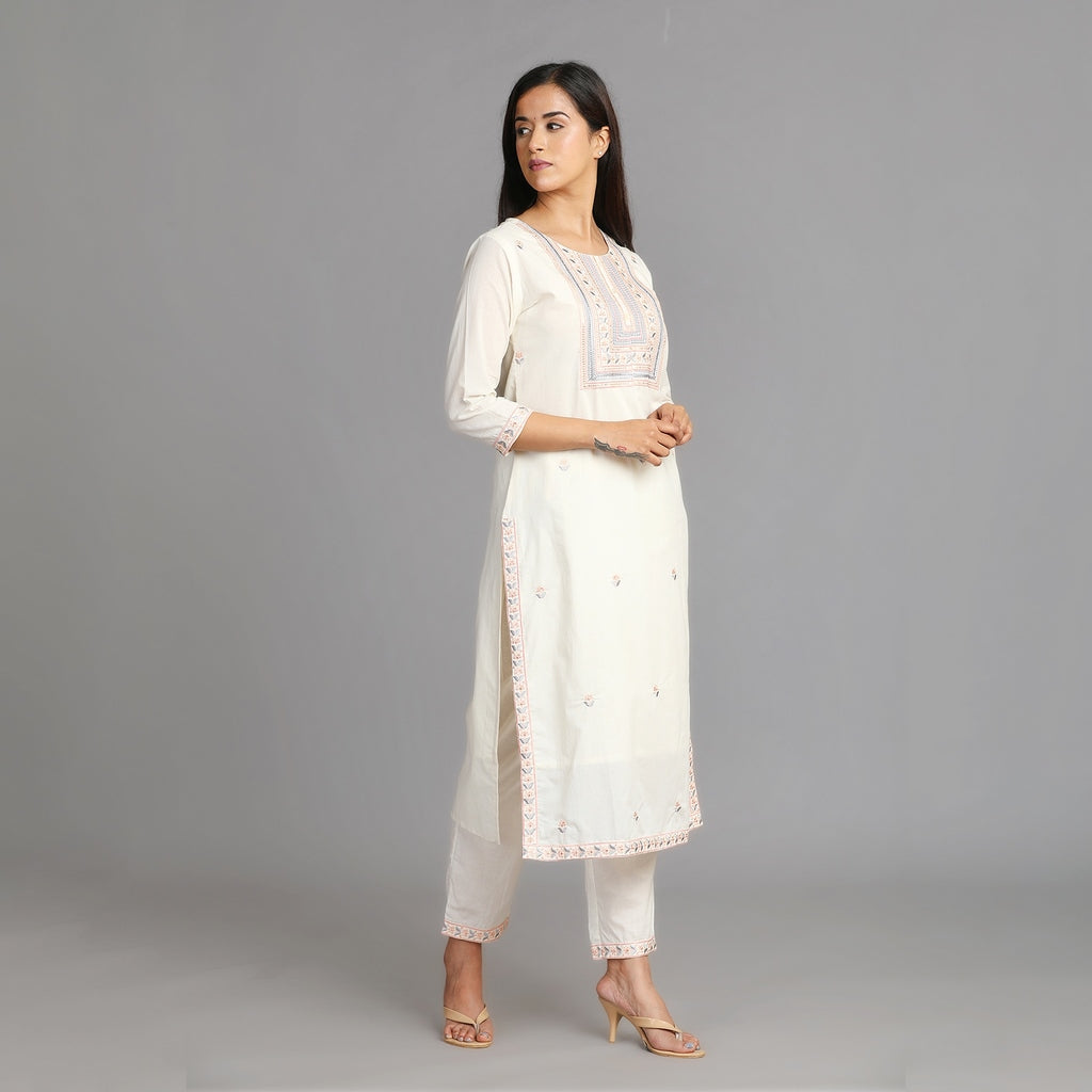 Off-White Cotton Suit Set with All Over Embroidery and Heavy Neckline– 3pc - Aavarana by Karnika